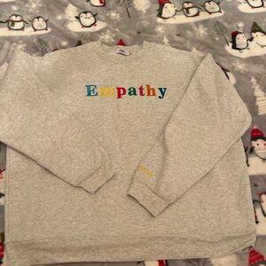 Mayfair Group Empathy Gray Sweatshirt with Colorful 'Empathy' Text